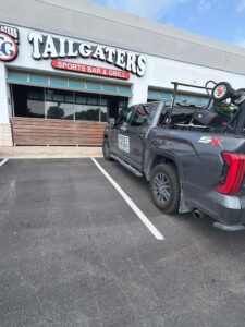 Pest Me Off service truck outside a sports bar and grill during a commercial general pest prevention visit in McKinney, Texas.
