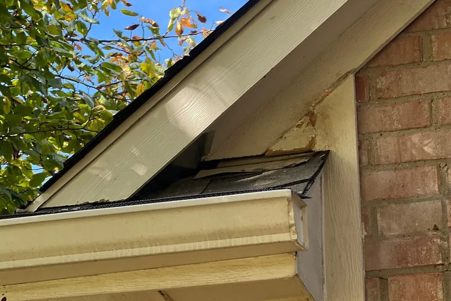 Pest Control Carrollton, TX 12 Roof eave and fascia corner gap, a rodent entry point on a Pest Me Off job