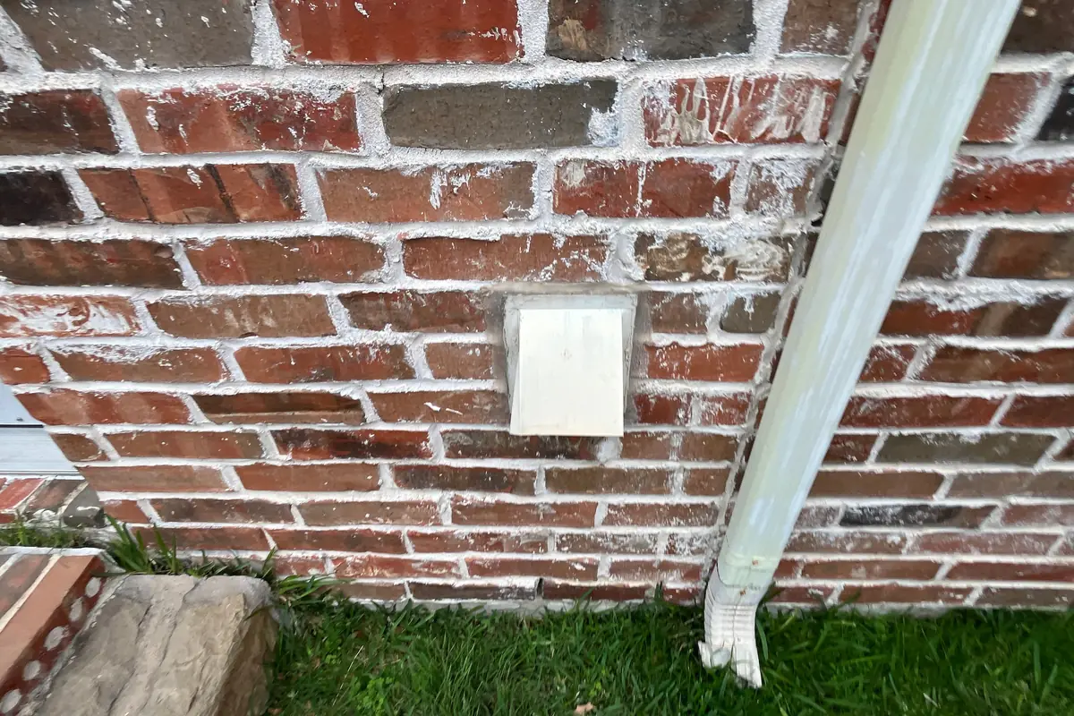 Pest Control Celina, TX 15 New cover installed on an open brick weep hole on a Pest Me Off job in McKinney, TX